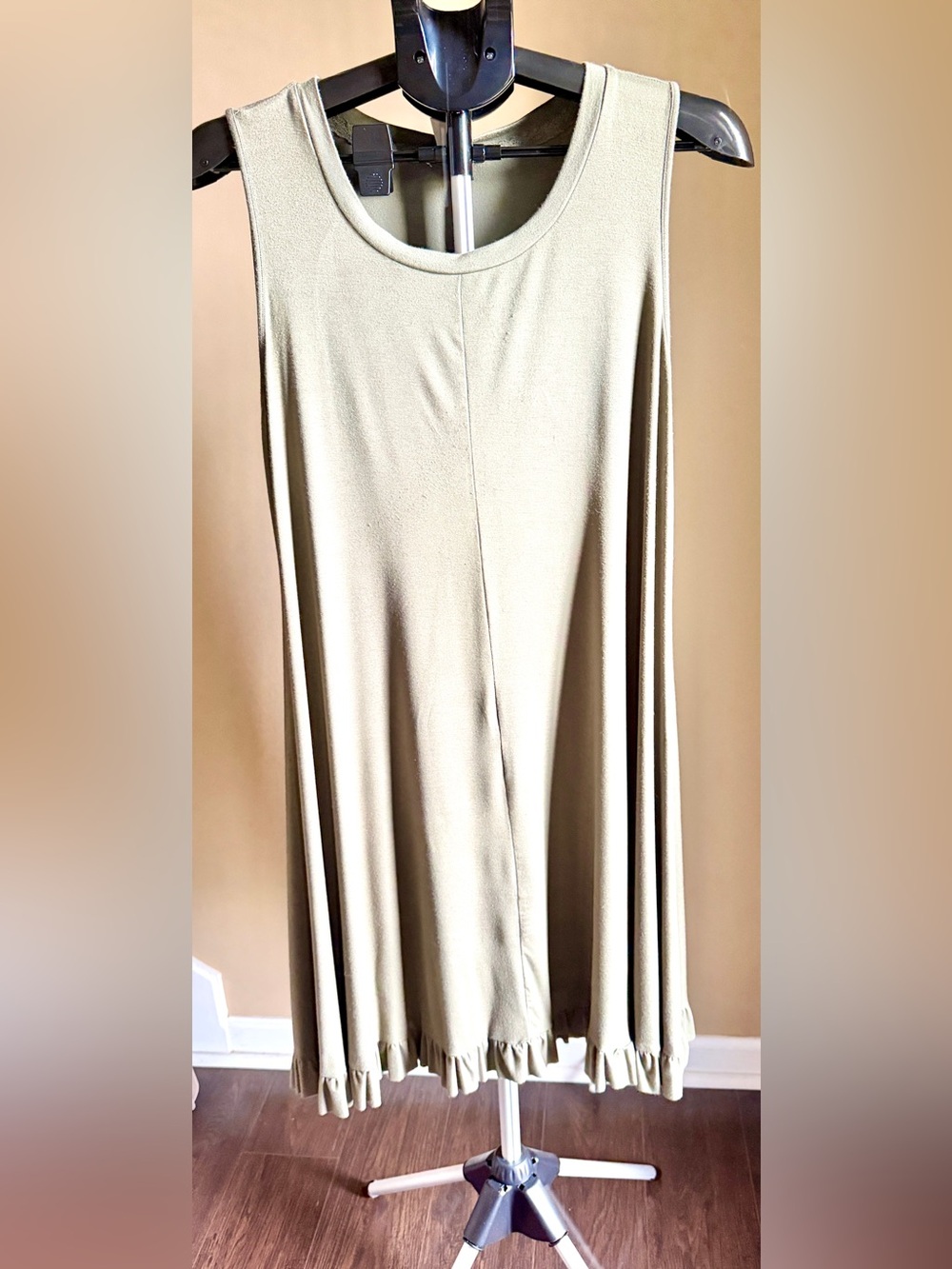 Olive green sleeveless summer dress.